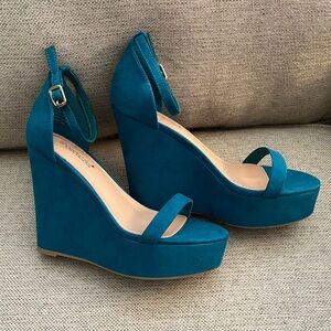 Never worn teal wedges! Size 8